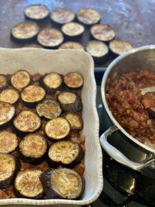 Vegetarian Moussaka with Lentil and Aubergine Layering the Mixture
