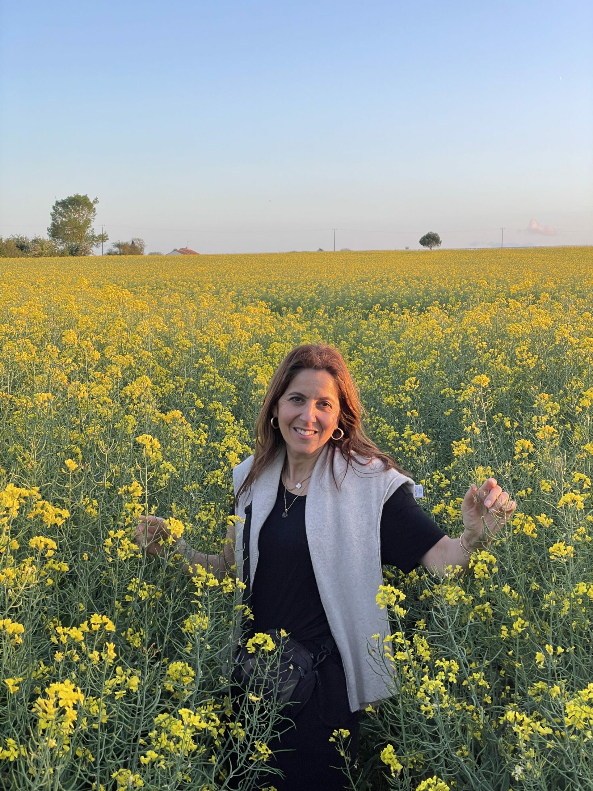 Welless trends I dont subscribe to | Nutritionist May Simpkin in a rapeseed field, Loire Valley, France